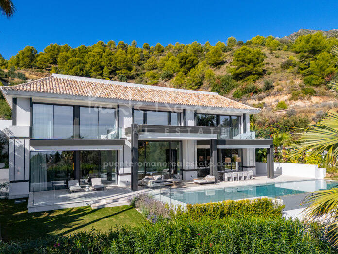 Villa Allure, contemporary elegance in Cascada de Camoján with endless Mediterranean views