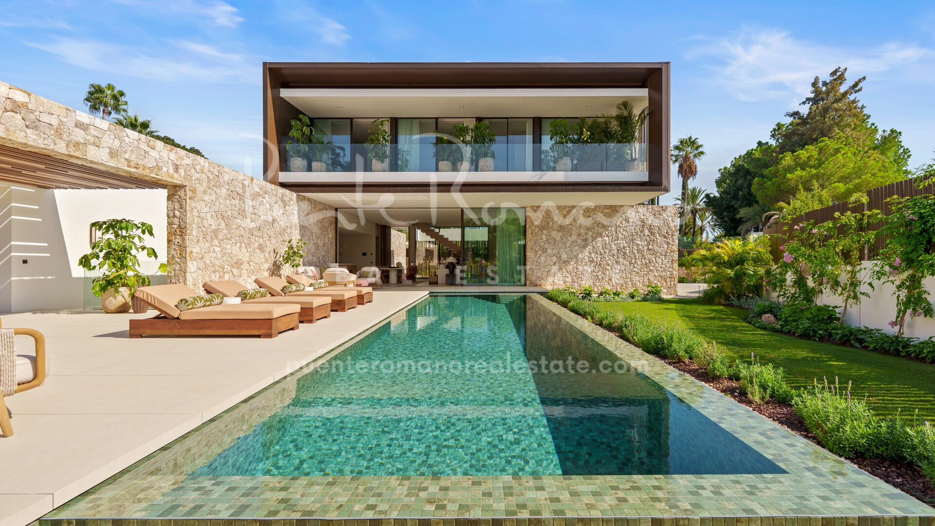 Contemporary villa with seamless indoor-outdoor design, natural materials and luxurious wellness areas