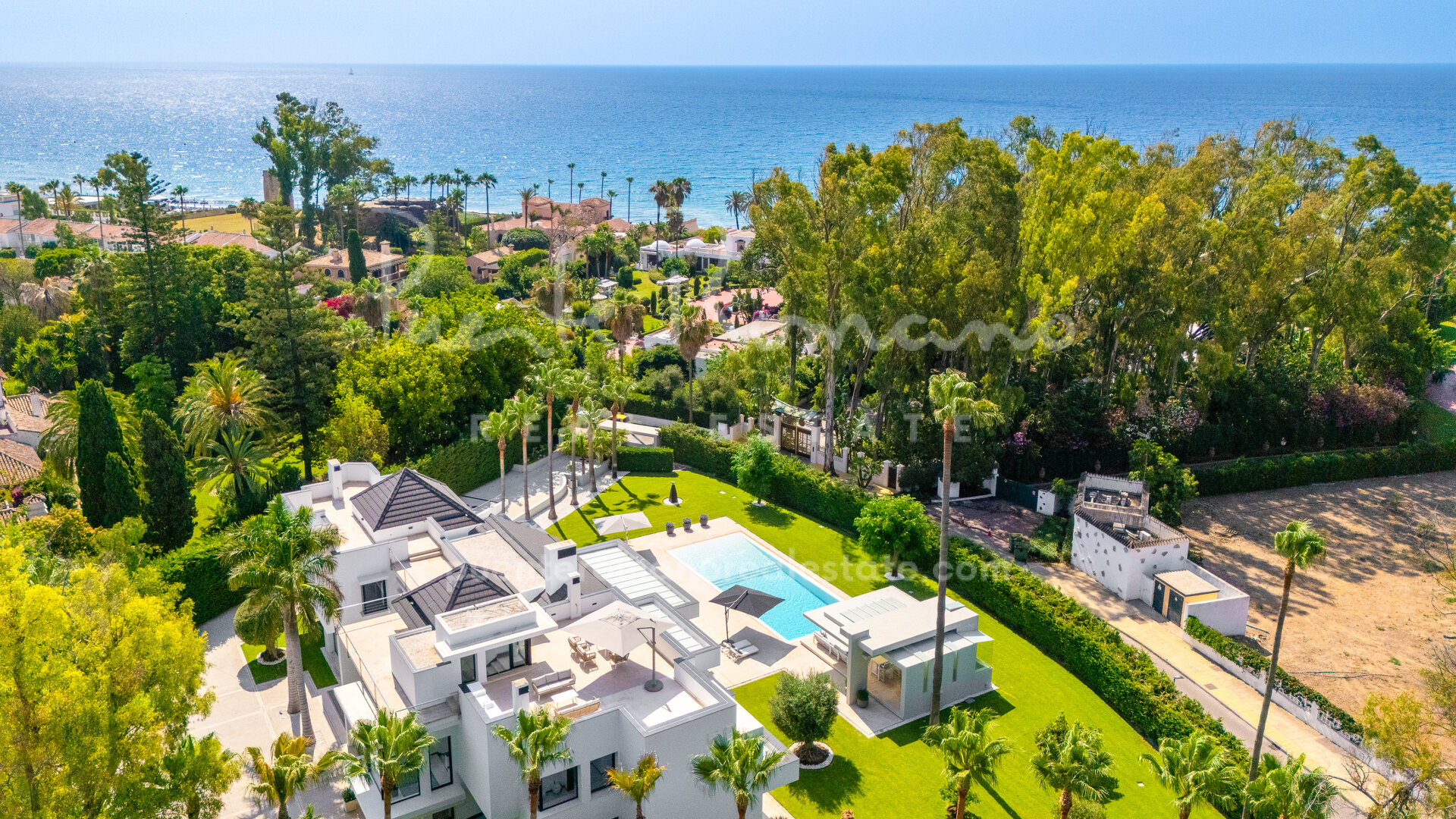 Elegant beachside villa in Guadalmina baja with exceptional privacy and contemporary design